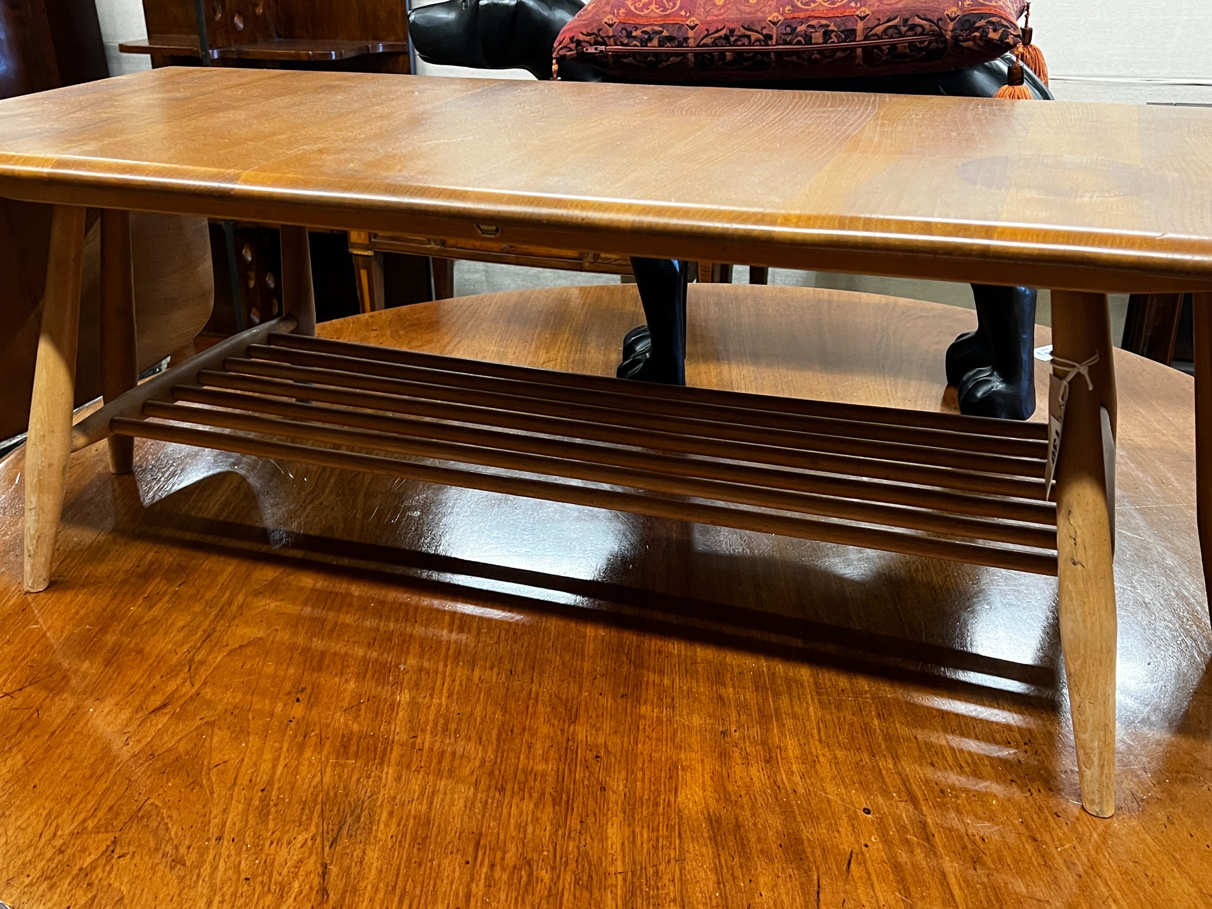 An Ercol elm drop flap coffee table, length 106cm, depth 45cm, height 36cm